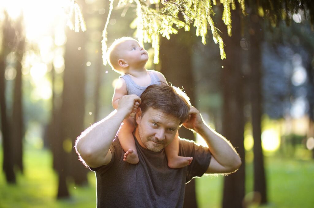 Father with baby on his shoulders