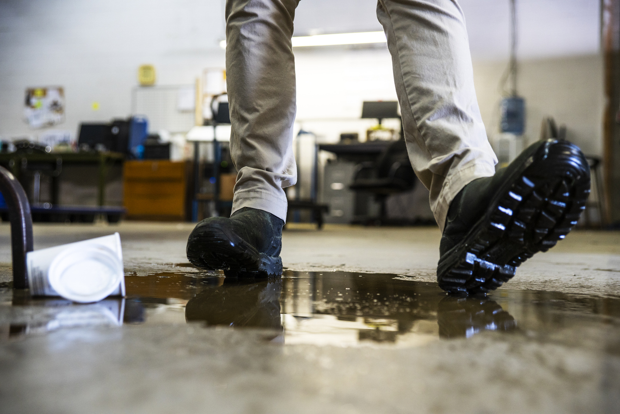 Man slipping on spilled coffee