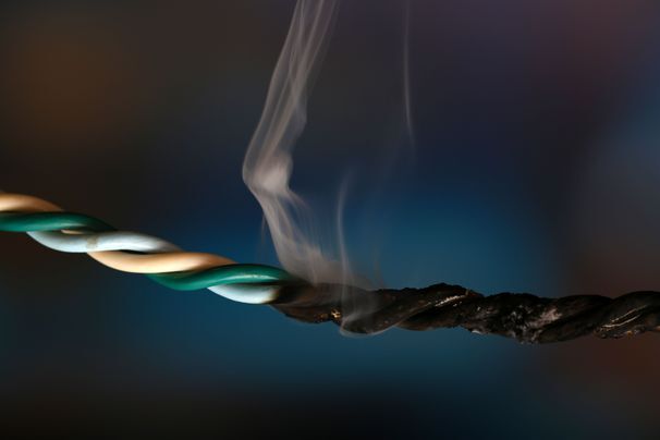 Close-up of a burning electrical wire