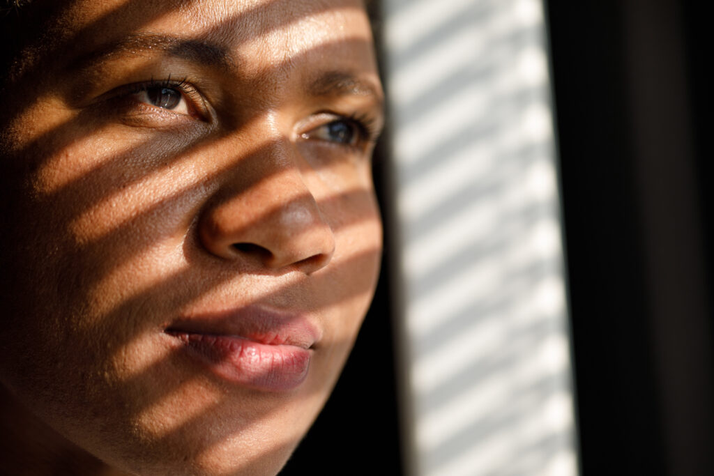 Woman thinks about her cancer diagnosis.